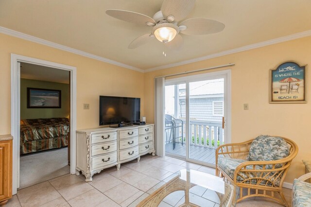 interior space featuring crown molding, light tile patterned flooring, and ceiling fan