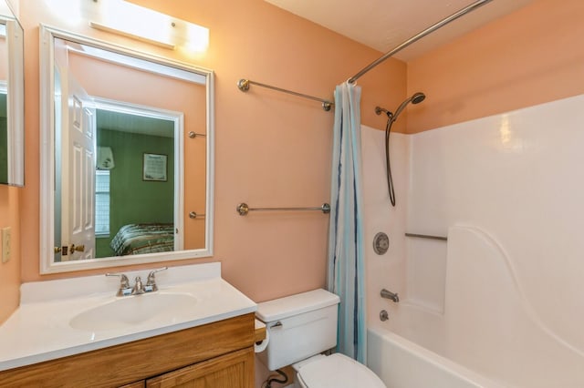 full bathroom featuring vanity, toilet, and shower / tub combo with curtain