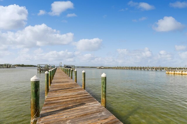 dock area featuring a water view