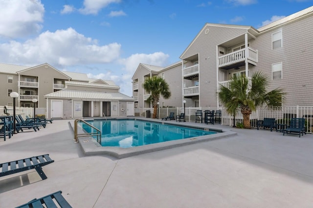 view of pool featuring a patio area