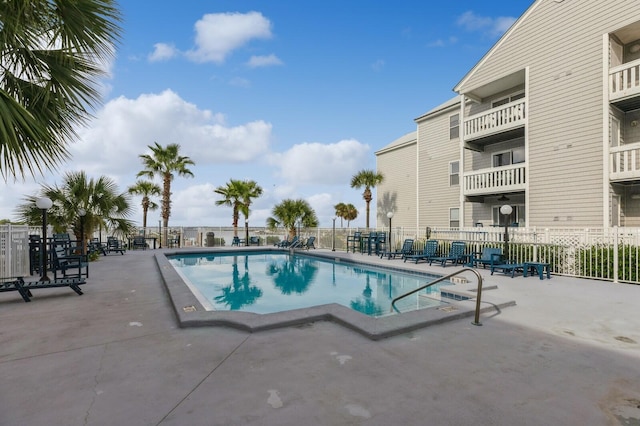 view of swimming pool featuring a patio