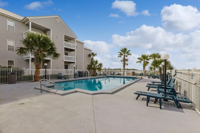 view of swimming pool featuring a patio