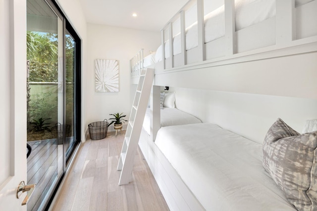 bedroom with light hardwood / wood-style floors