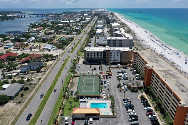 aerial view featuring a water view and a view of the beach