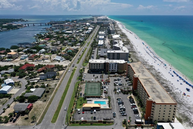 drone / aerial view featuring a view of the beach and a water view