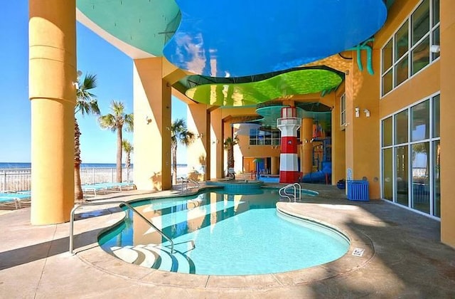 view of pool featuring a patio area