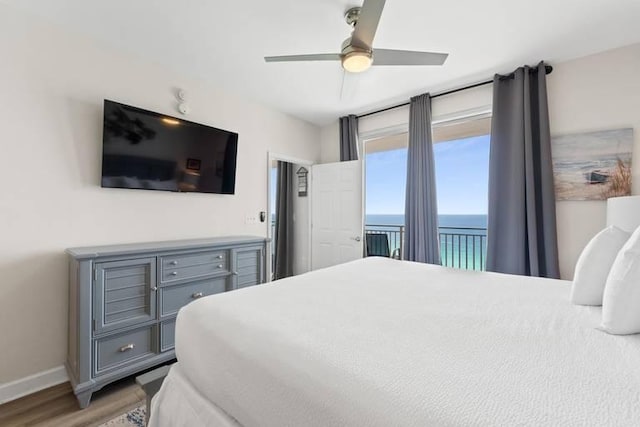 bedroom featuring ceiling fan, access to outside, and hardwood / wood-style floors