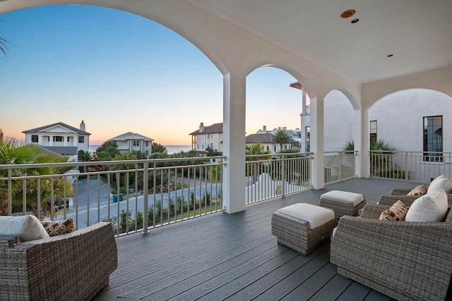 deck at dusk with a water view