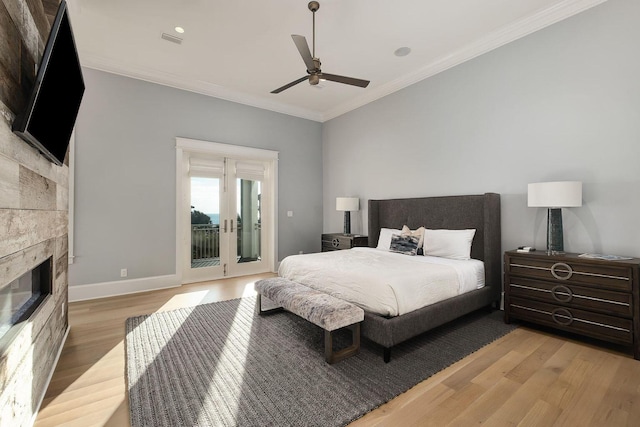 bedroom featuring crown molding, access to exterior, ceiling fan, and light wood-type flooring