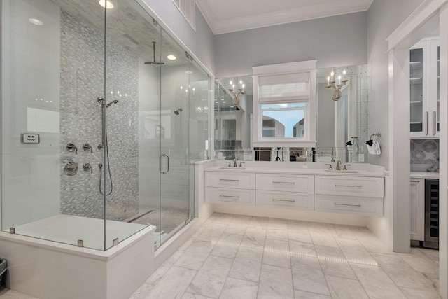 bathroom featuring a shower stall, wine cooler, double vanity, ornamental molding, and a sink