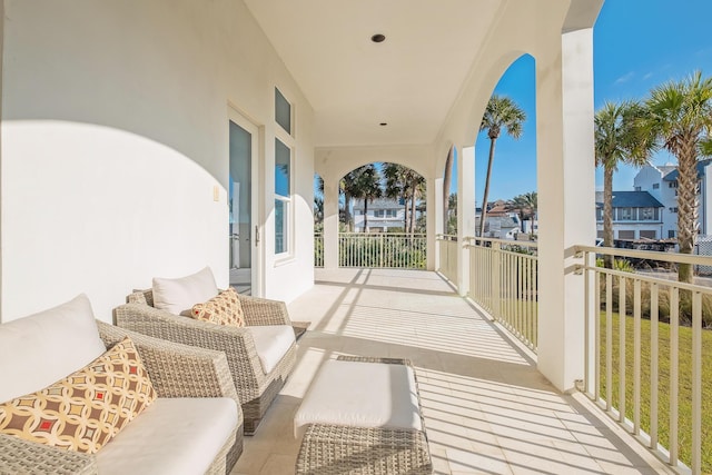 view of patio / terrace featuring an outdoor living space and a balcony