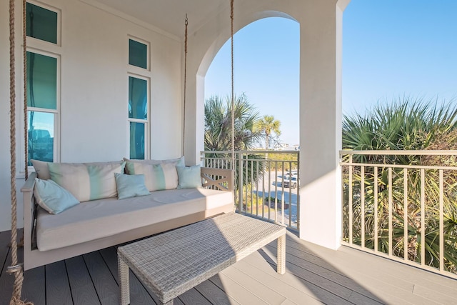 balcony with an outdoor hangout area