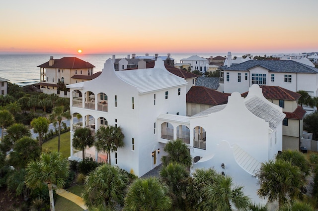 bird's eye view featuring a residential view and a water view