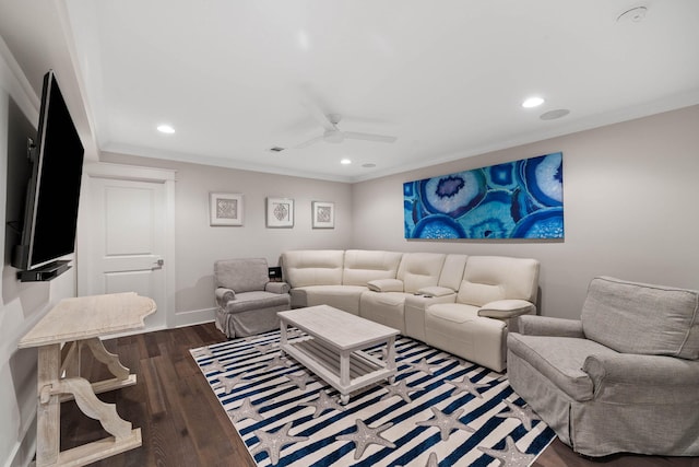 living room featuring hardwood / wood-style flooring, ornamental molding, and ceiling fan