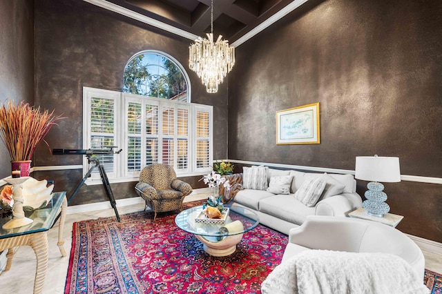 living room with a chandelier, beamed ceiling, coffered ceiling, a towering ceiling, and ornamental molding