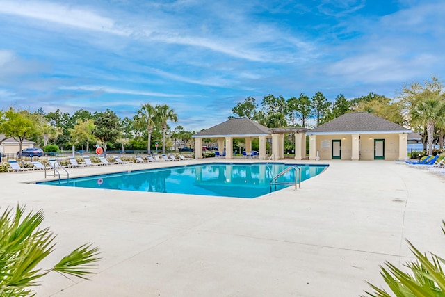 view of swimming pool featuring a patio