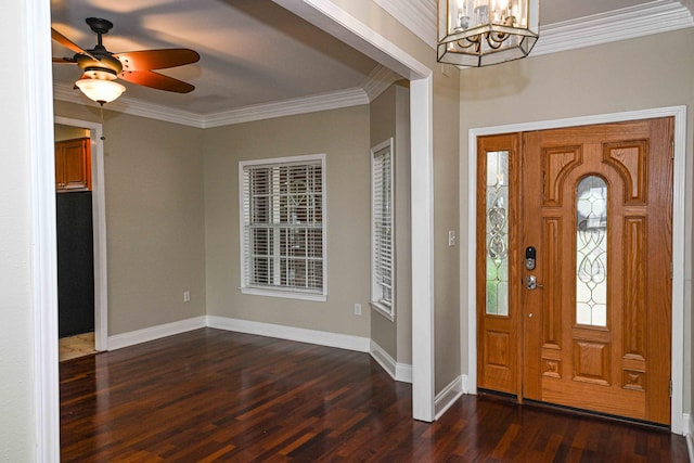 entryway with ceiling fan with notable chandelier, crown molding, and dark hardwood / wood-style floors