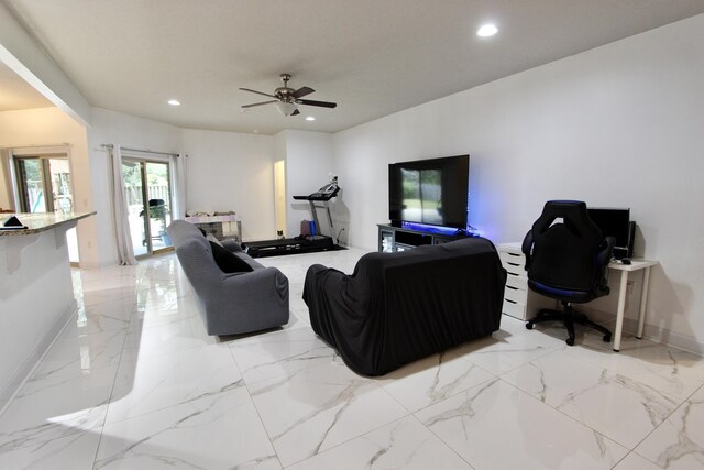 living room with ceiling fan