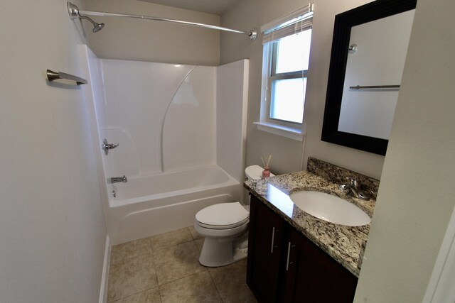 full bathroom with tile patterned flooring, toilet, bathing tub / shower combination, and vanity