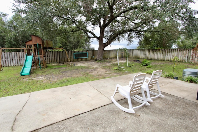 view of patio featuring a playground