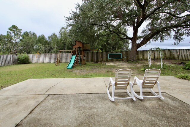 view of patio featuring a playground