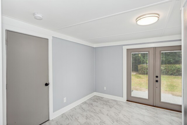 empty room featuring french doors