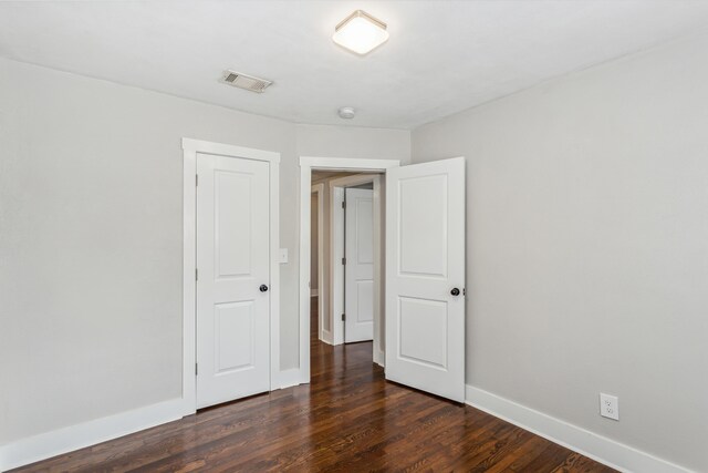 interior space featuring dark wood-type flooring