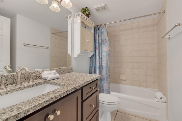 520 Santa Rosa Blvd Unit 301, Fort Walton Beach, FL 32548 - bathroom featuring shower / bath combo, visible vents, toilet, tile patterned floors, and vanity