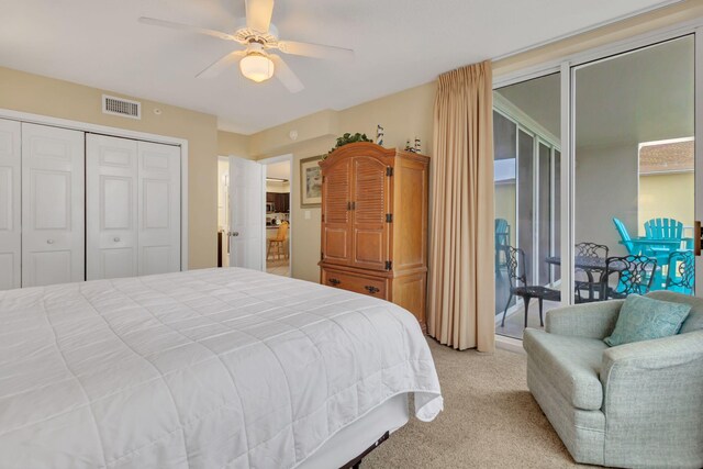 520 Santa Rosa Blvd Unit 301, Fort Walton Beach, FL 32548 - bedroom with a closet, visible vents, ceiling fan, light carpet, and access to exterior