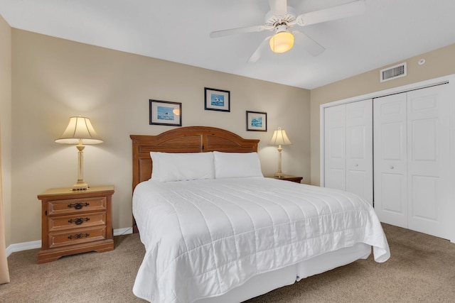 520 Santa Rosa Blvd Unit 301, Fort Walton Beach, FL 32548 - carpeted bedroom featuring a closet, baseboards, ceiling fan, and visible vents