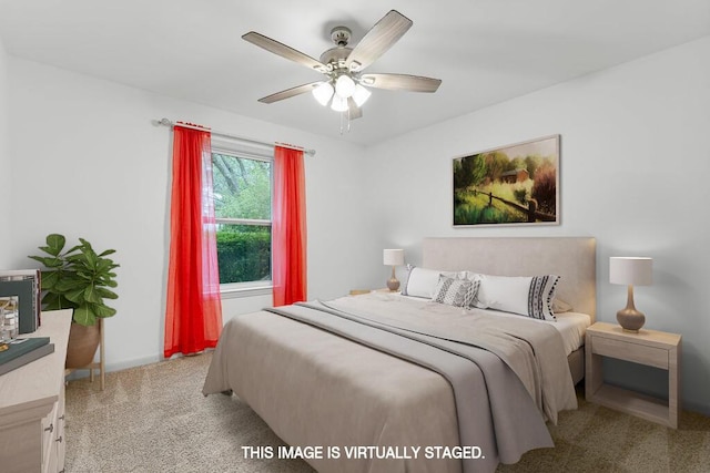 carpeted bedroom featuring ceiling fan