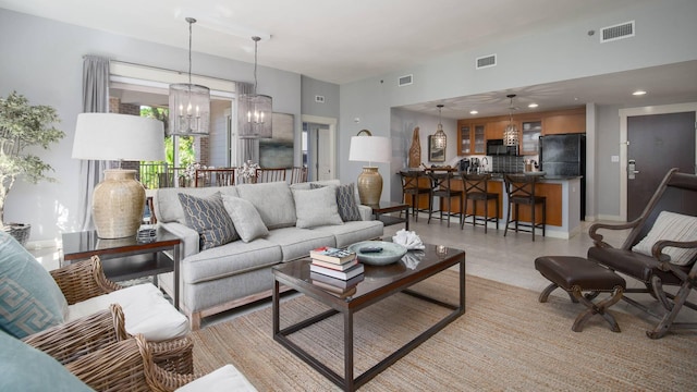 living room with a chandelier