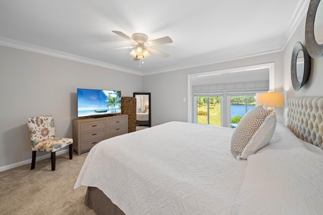 bedroom featuring light colored carpet, ceiling fan, and ornamental molding