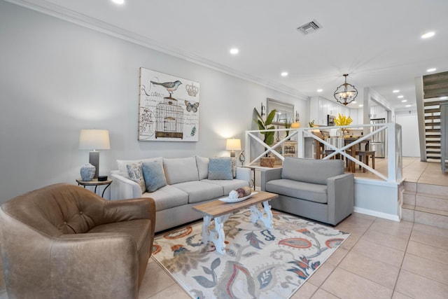 tiled living room featuring a chandelier and ornamental molding