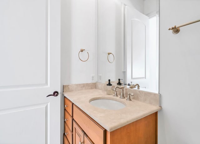 bathroom featuring vanity and plenty of natural light