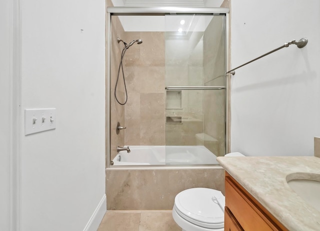 full bathroom featuring tile patterned flooring, vanity, enclosed tub / shower combo, and toilet