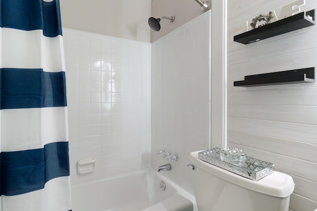 bathroom with toilet and shower / bath combination with curtain