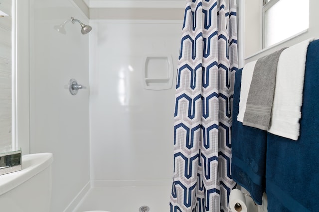 bathroom with a shower with shower curtain