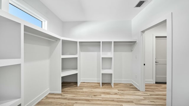 walk in closet featuring light wood-type flooring