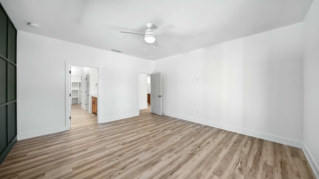 unfurnished bedroom with light hardwood / wood-style floors and ceiling fan