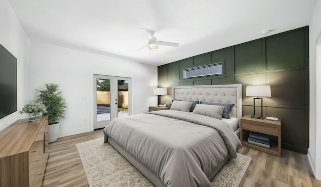 bedroom featuring access to outside, ceiling fan, french doors, and light wood-type flooring