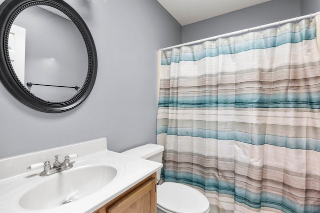 2205 Calle De Marbella, Navarre, FL 32566 - full bath with a shower with shower curtain, toilet, and vanity