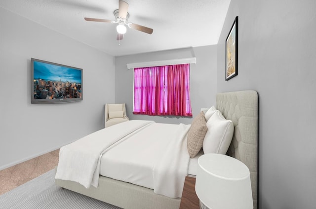 2205 Calle De Marbella, Navarre, FL 32566 - carpeted bedroom with baseboards and a ceiling fan