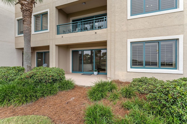 doorway to property with a balcony