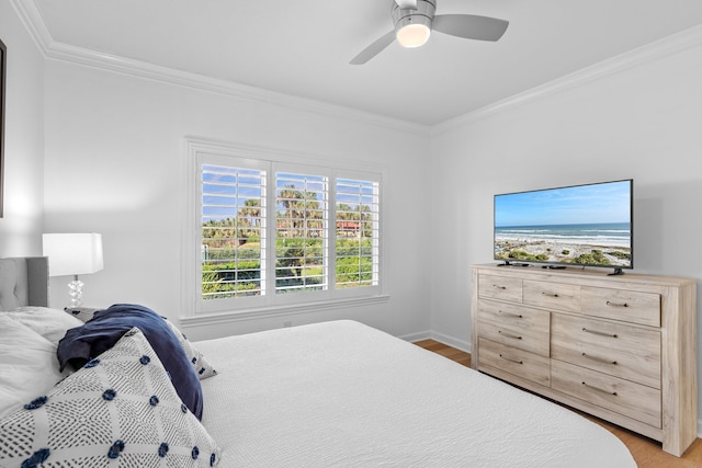 bedroom with crown molding and ceiling fan