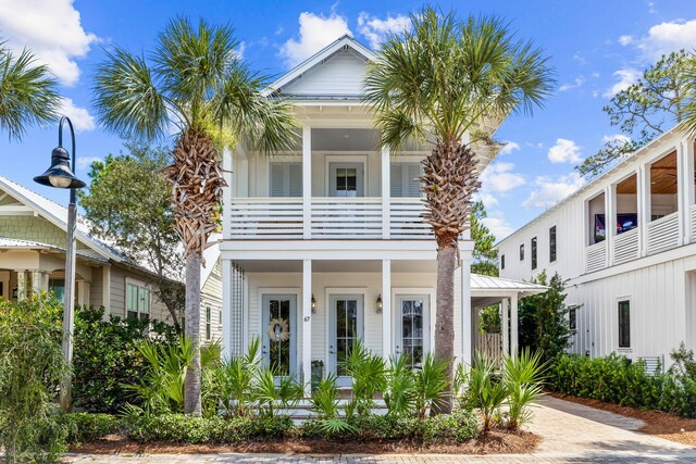 view of front of property with a balcony