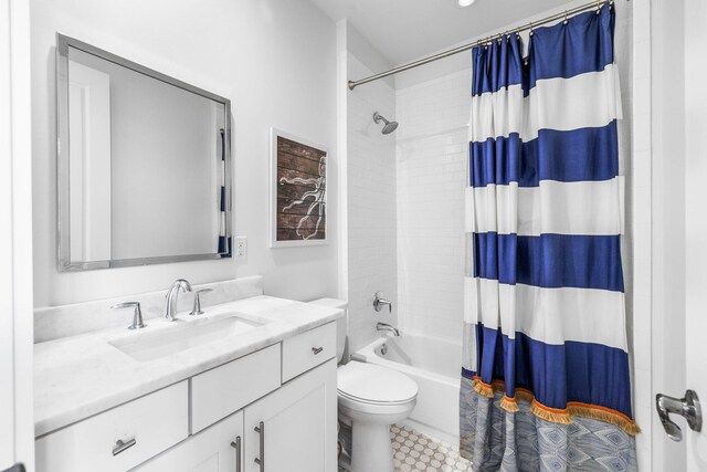 full bathroom featuring vanity, toilet, and shower / bathtub combination with curtain