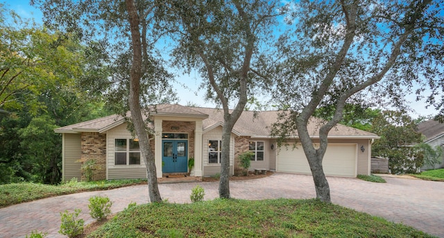 ranch-style house with a garage