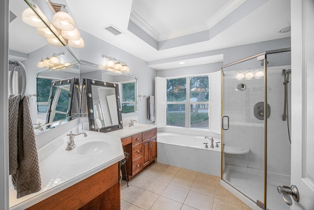 bathroom featuring tile patterned flooring, crown molding, vanity, independent shower and bath, and a tray ceiling