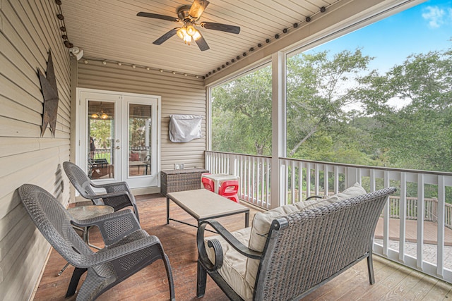 exterior space featuring ceiling fan and wood ceiling